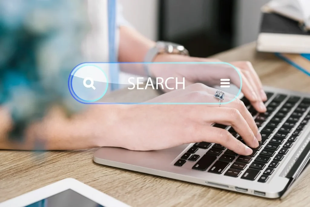 person-typing-on-laptop-with-search-bar
