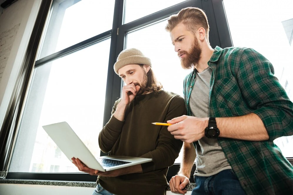 two-SEO-person-looking-at-SEO-report