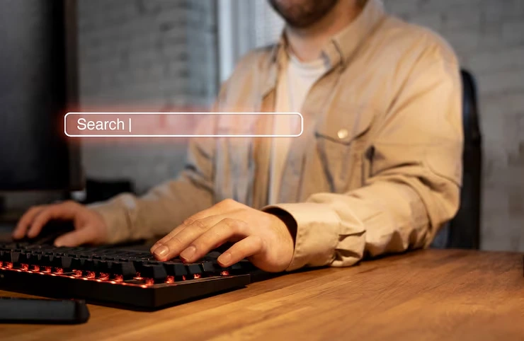 An Expert typing at a keyboard with a digital search bar overlay, representing keyword research and on-page SEO services for Canadian pet shops.