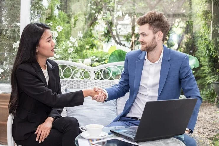 Local SEO professionals partnering to build high-quality backlinks for a Canadian hotel